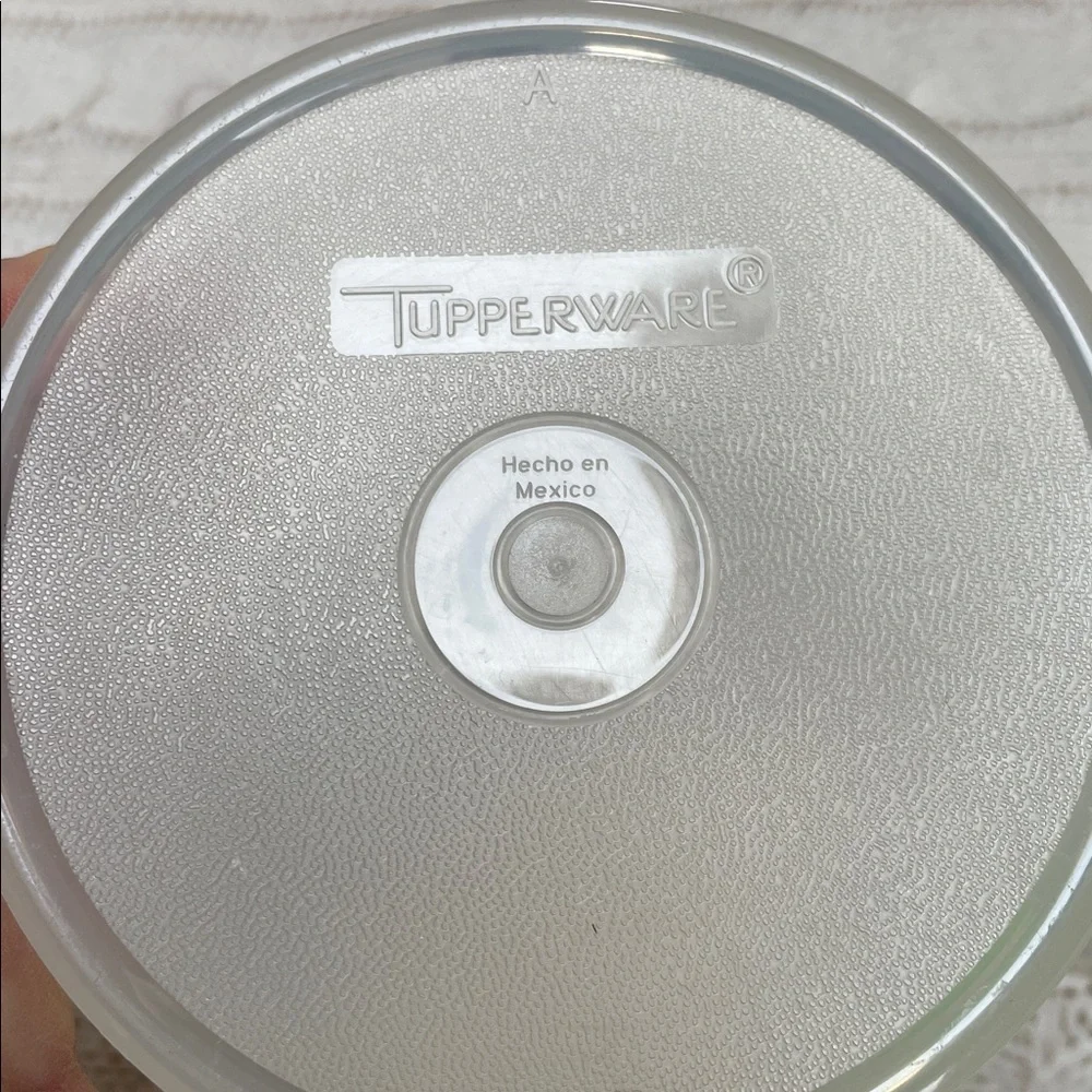 Tupperware storage with light Green Lids. Lot of 2. Round circular